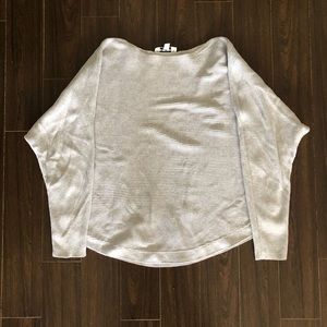 Boat neck, dolman sleeve ribbed sweater.